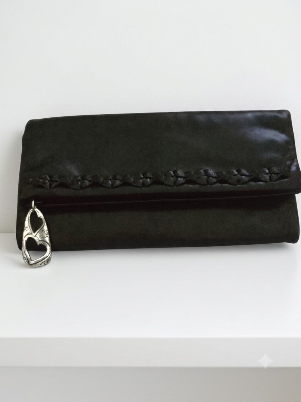 Brighton Black Fold-Over Clutch with Braided Trim and Silver Charm